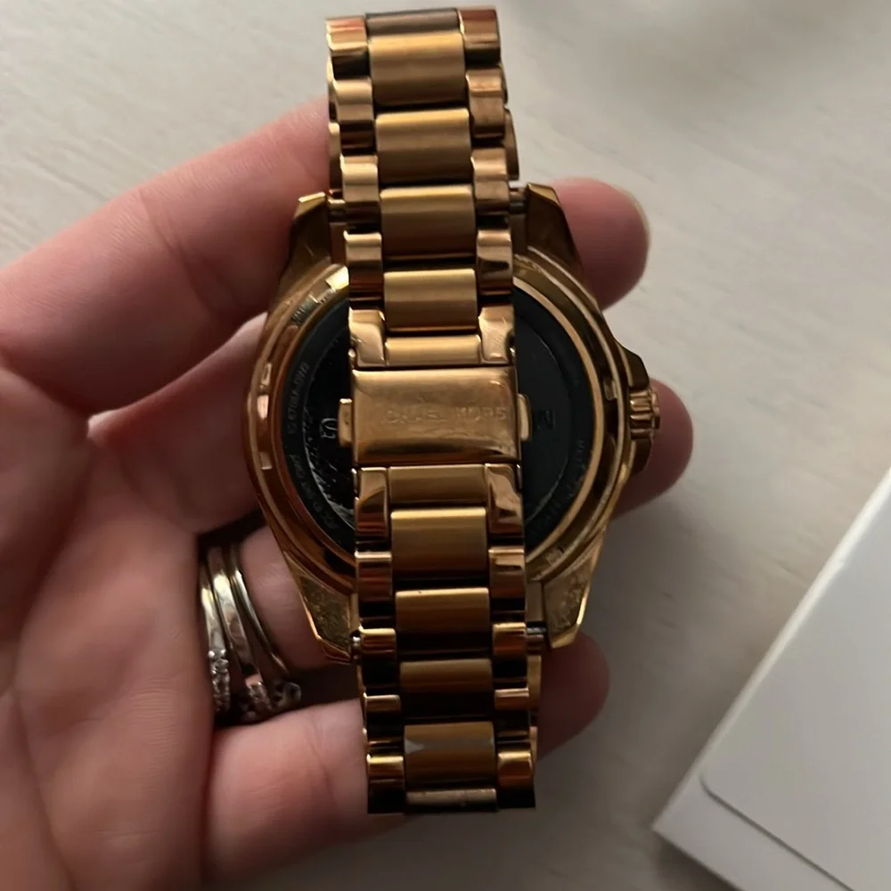 Michael kors smart watch with charger and paperwork